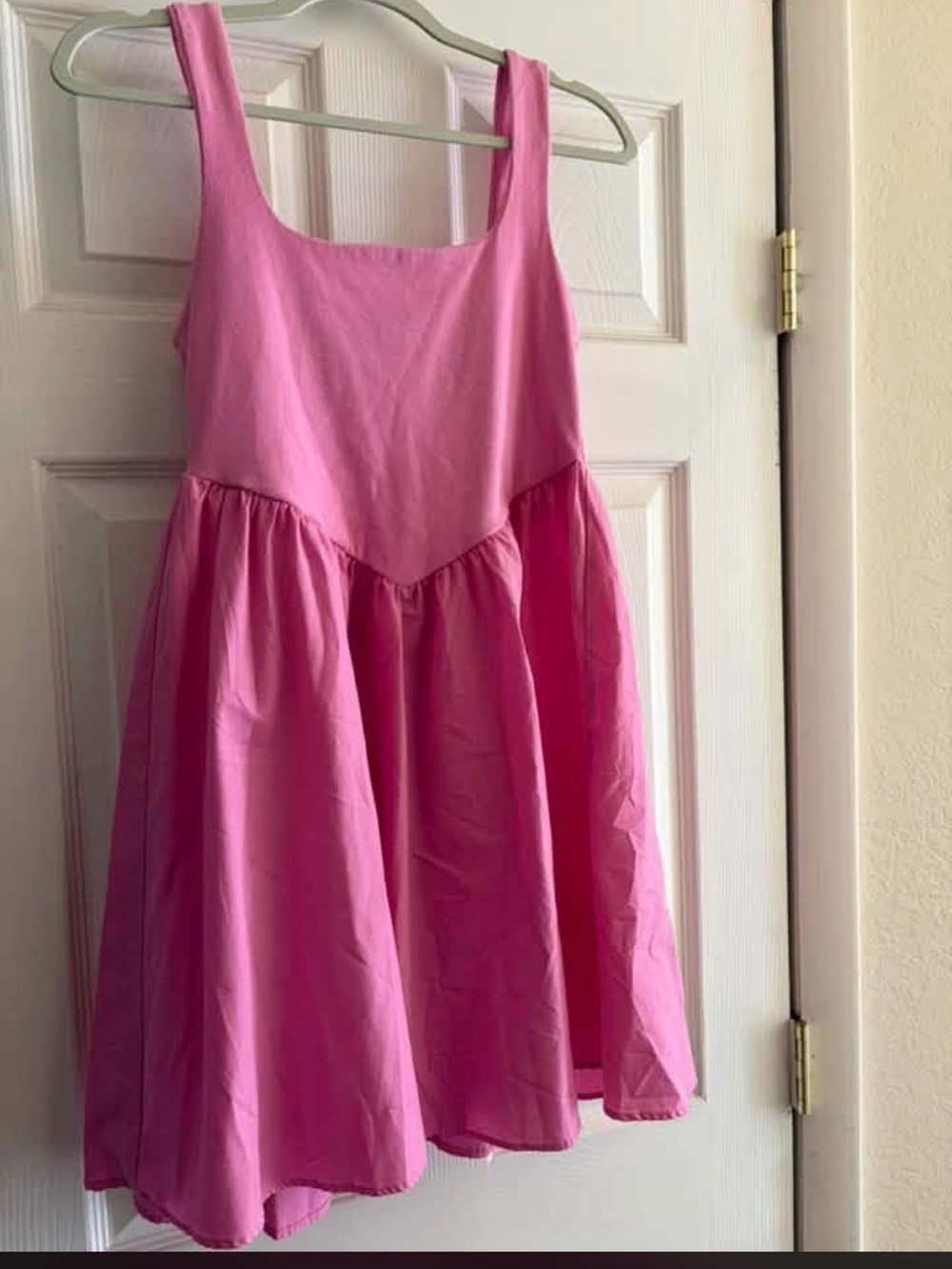 Sleeveless Pink Mini Dress with Flared Skirt